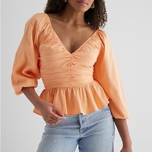 Express Orange V-Neck Pleated Peplum Top